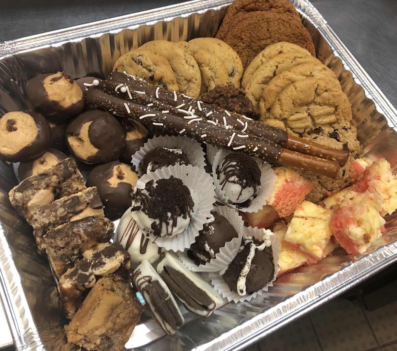 Catering dessert tray of cookies, brownies, buckeyes and cake bites